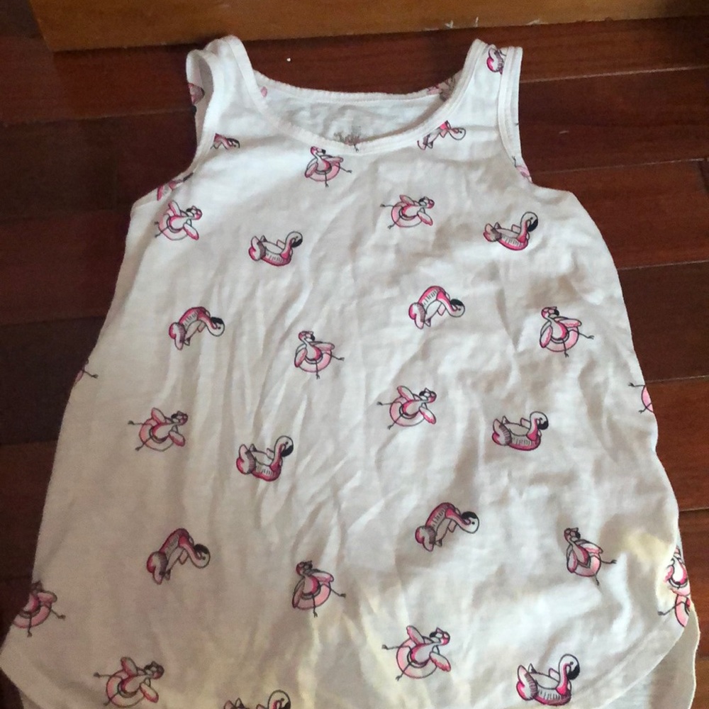 A white flamingo tank top
